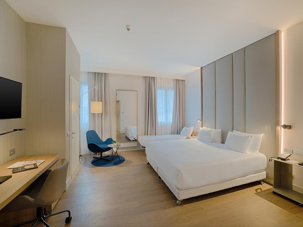 NH Hotel de la Gare Bologna — Bologna, Italia — ambiente 1