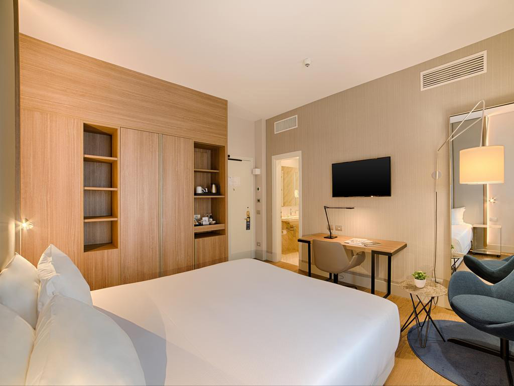 NH Hotel de la Gare Bologna — Bologna, Italia — ambiente 3
